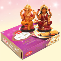 Laxmi Ganesha idol with Soan papdi