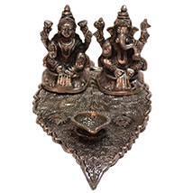 Metallic statue of Laxmi & Ganesha