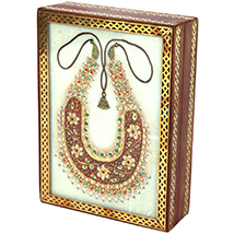 Marble jewellery box with open dazzling kundan necklace