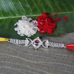 Stone Studded Dazzling Rakhi /></a></div><div class=