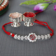 Dazzling Om Rakhi /></a></div><div class=