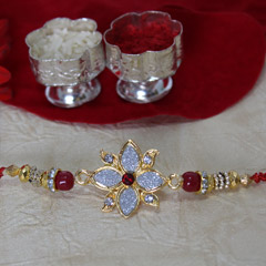Silver, Golden & Red Rakhi /></a></div><div class=