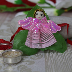 Cute Pink  Doll Rakhi /></a></div><div class=