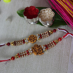 OM and Ganesha Rakhi Set /></a></div><div class=