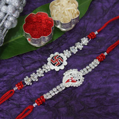 Stone Studded Silver Rakhi Set /></a></div><div class=