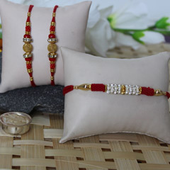 Red, Golden & Silver Rakhi Set /></a></div><div class=