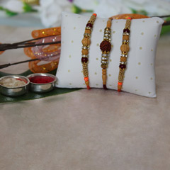 Elegantly Beaded Rakhi Set /></a></div><div class=