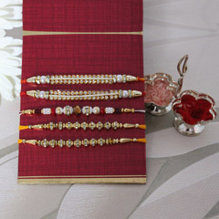 Red N Gorgeous Rakhi Set /></a></div><div class=
