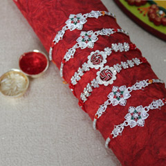 Divine Rakhi Set /></a></div><div class=