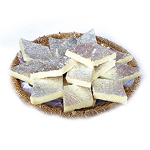 Kaju Katli In Golden Round Tray